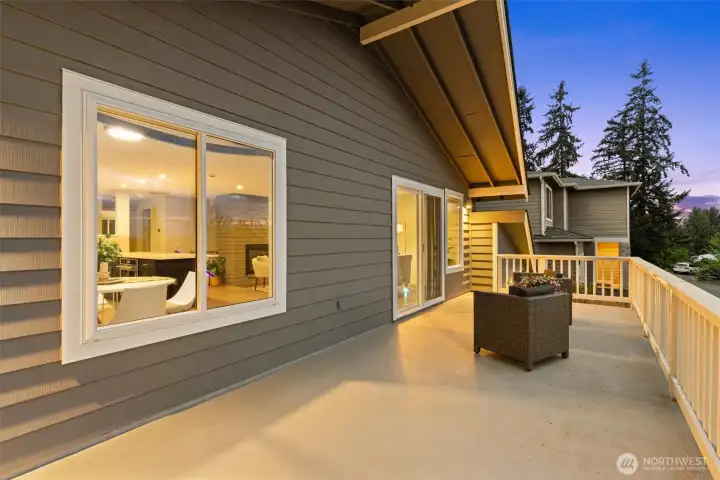 Spacious entertainment deck off the main living area, perfect for outdoor dining, relaxing, and enjoying northwest-facing territorial views.