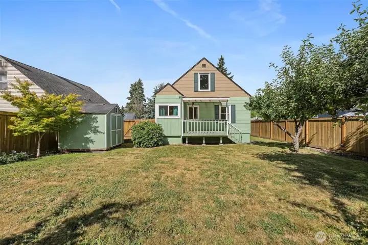 Backside of the house. Spacious backyard