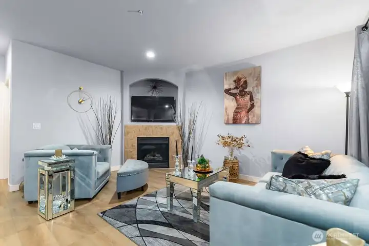 Arched architectural features, stylish pendant lighting, and premium flooring.