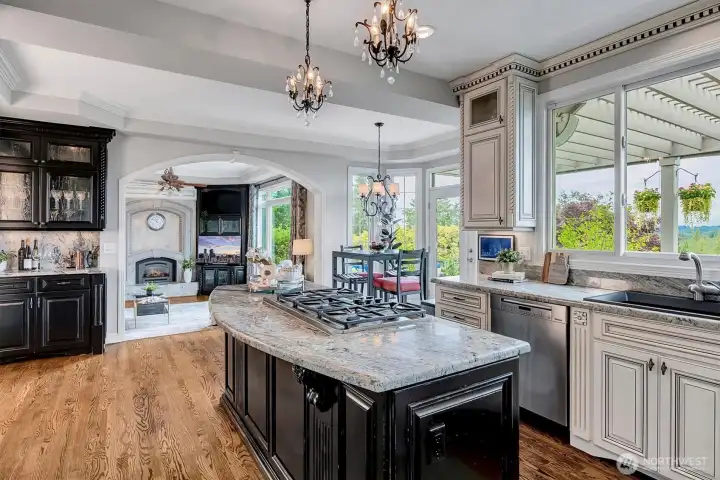 Updated kitchen with stainless appliances. Distressed cabinetry throughout Updated kitchen with stainless appliances. Distressed cabinetry throughout