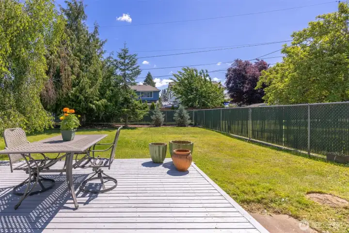 Enjoy a warm summer evening on this deck, sitting around the table, enjoying family and friends.