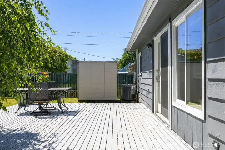 Large deck is great for enjoying the outdoors and entertaining.