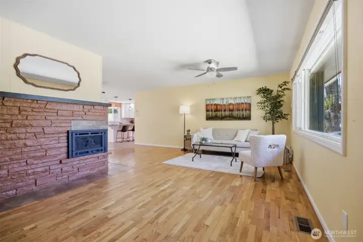 Living room has the beautiful oak floor that is the signature flooring of a mid-century home.