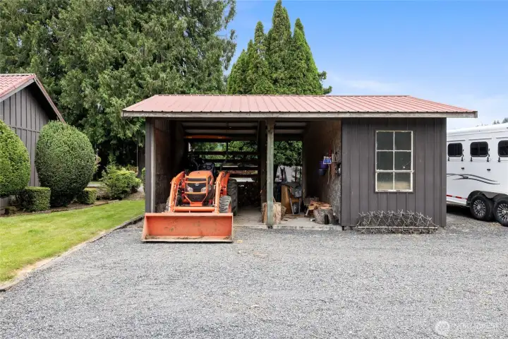 18x24 Wood shed that is partially enclosed for additional storage