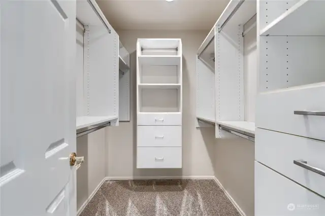 Primary bedroom walk-in closet.