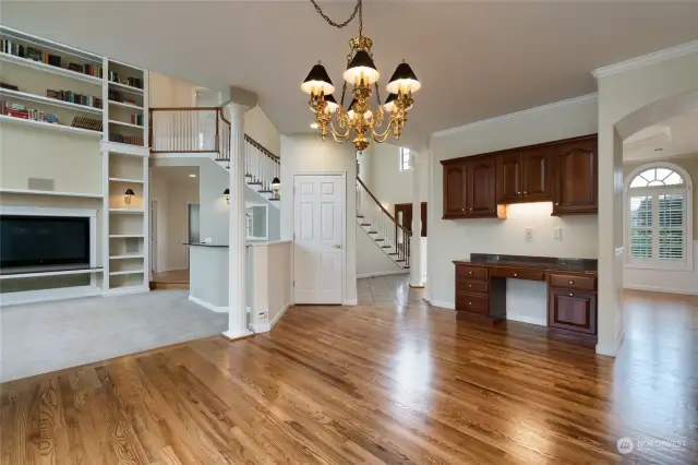 Kitchen eating area. The desk area in the kitchen features granite countertops and great storage. Coat closet features great storage. Coat closet connects to the storage/playrooom room underneath the stairs.