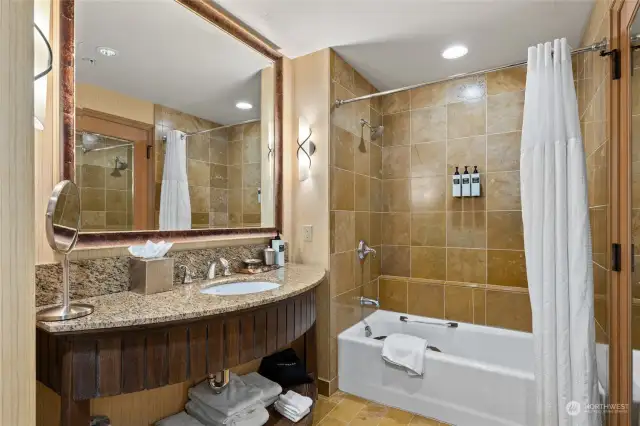 Tub/shower in bathroom.