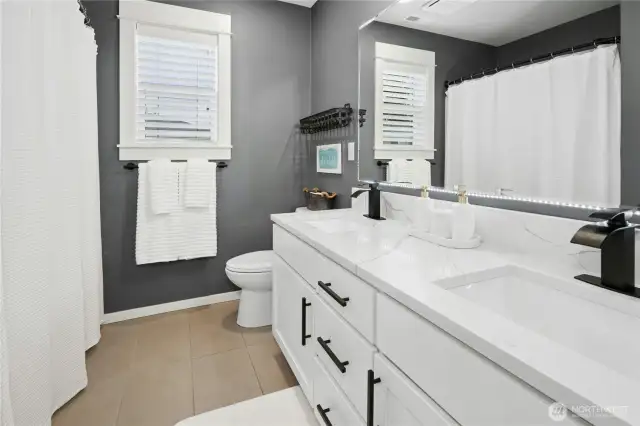 Upstairs full bathroom with updated Quartz counters and paint