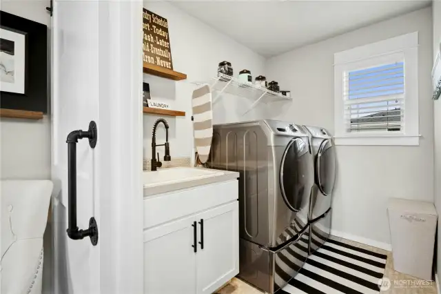 Upstairs laundry room with barn door (W/D stays!)
