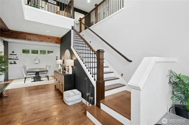 Custom Beams and hardwoods added to the stairs and upstairs hallway