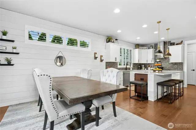 Tons of cabinet and storage space. Upgraded Quartz, extended island & new pendant lighting