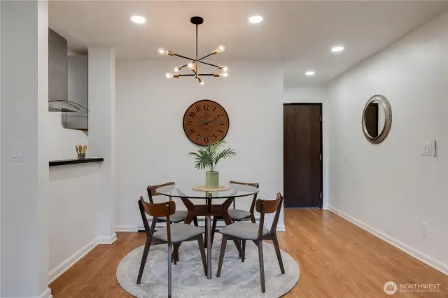 Dining room with beautiful and modern light fixture