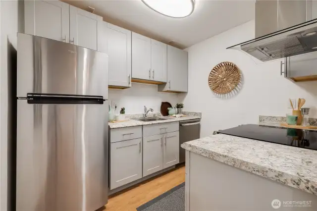 Kitchen with newer refrigerator