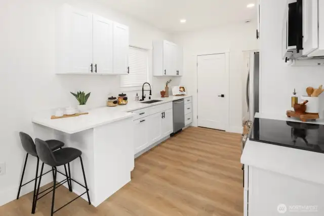 All new cabinets & quartz countertops