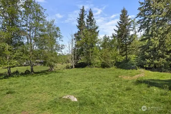 Another view of the fenced pasture