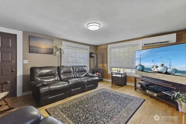 Living room has pretty wood floor.