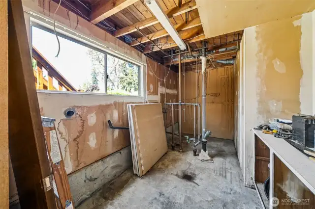 Roughed-in laundry and 3/4 bath downstairs.