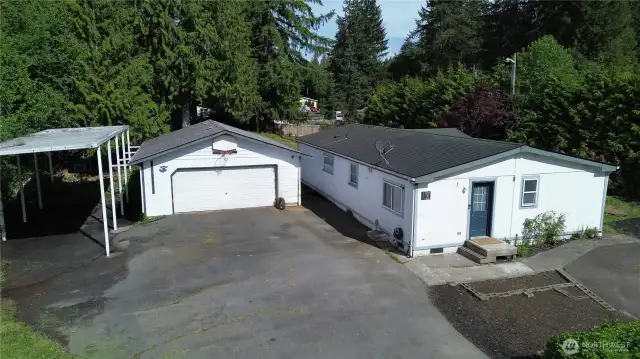 Doublewide REMODELED Manufactured home with a HUGE garage/ shop and RV Parking On a nice  Half acre corner lot