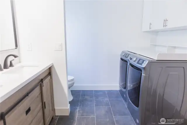 Master bath / laundry room (washer and dryer stays )