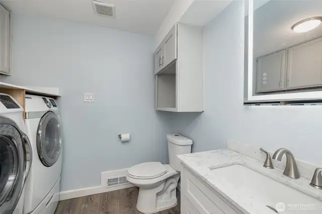 Utility room with guest bathroom.