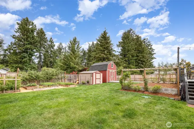 Custom built barn and tool shed/shop.