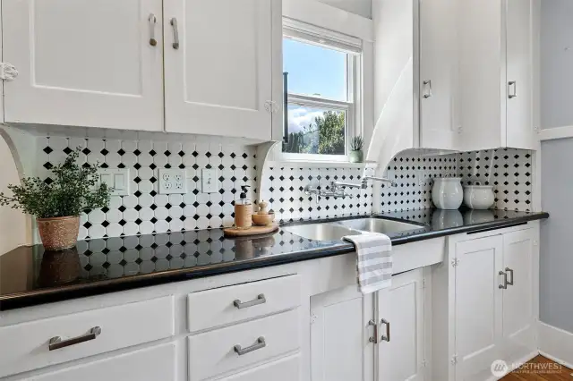 Kitchen in the backside of the home - you can overlook the beautiful gardens.