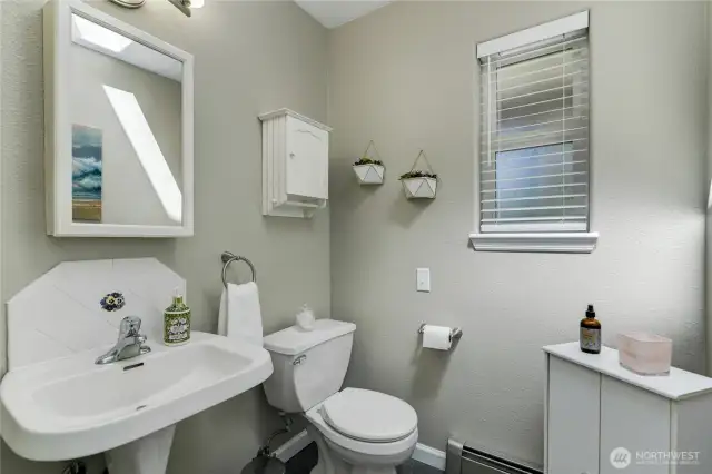 Powder bath off of kitchen.