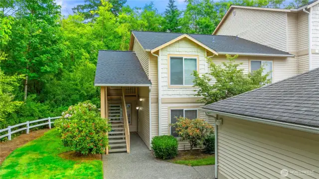 This condo is tucked back in a quiet corner, surrounded by greenspace.