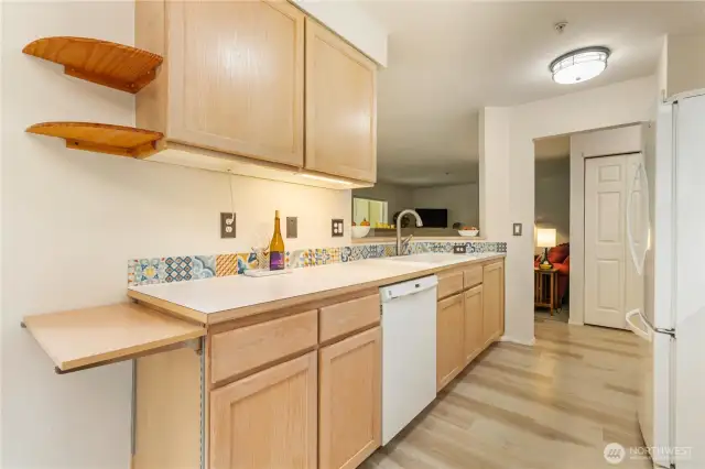 The kitchen is open to the living space and the dining room.