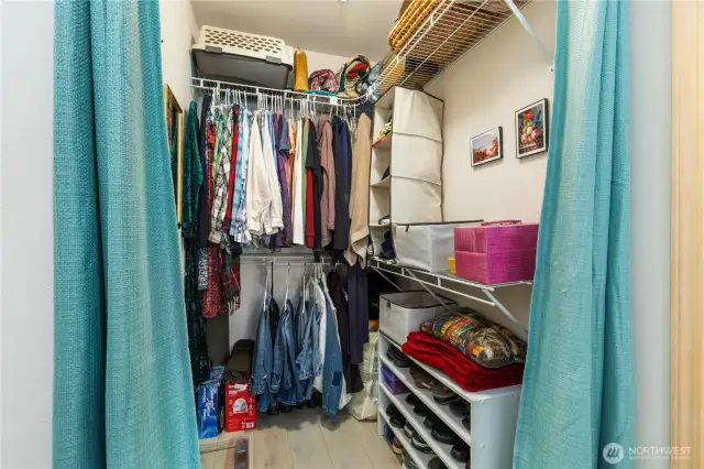 The primary bedroom's walk in closet.