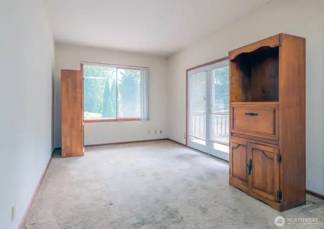2nd Living room/family room area showing French doors to deck.