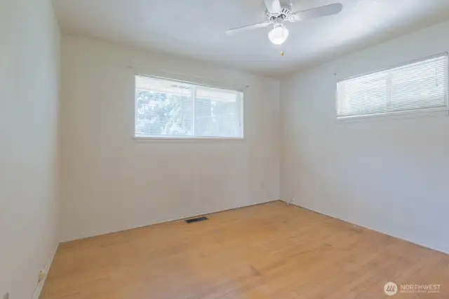 Across the hallway is this bedroom, often used as the primary bedroom in this wing.