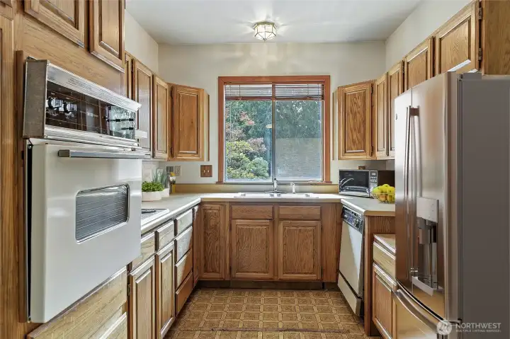 2nd kitchen next to primary suite. This wing of the home has been used as separate living quarters.