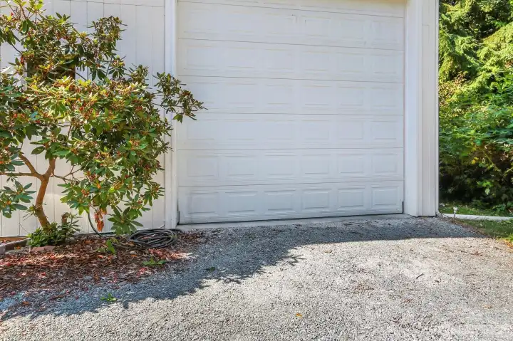 Side Garage Door to Interior Parking Area