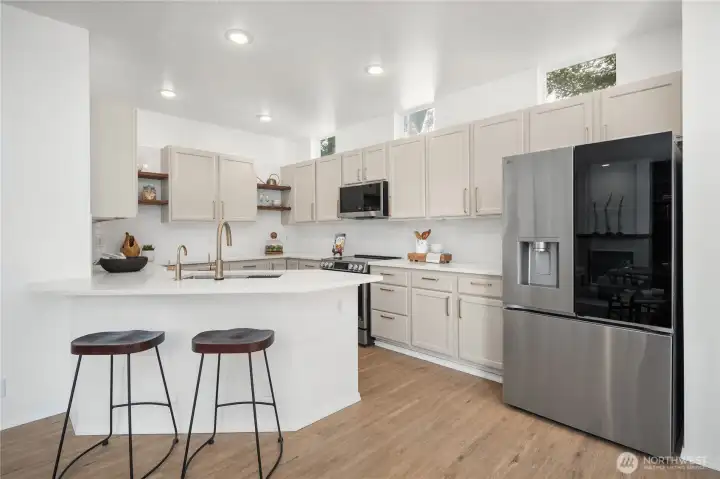 This beautiful kitchen was renovated last year. You simply have to see the cabinet color in person- it's unique and gorgeous with premium and hard-to-find pulls