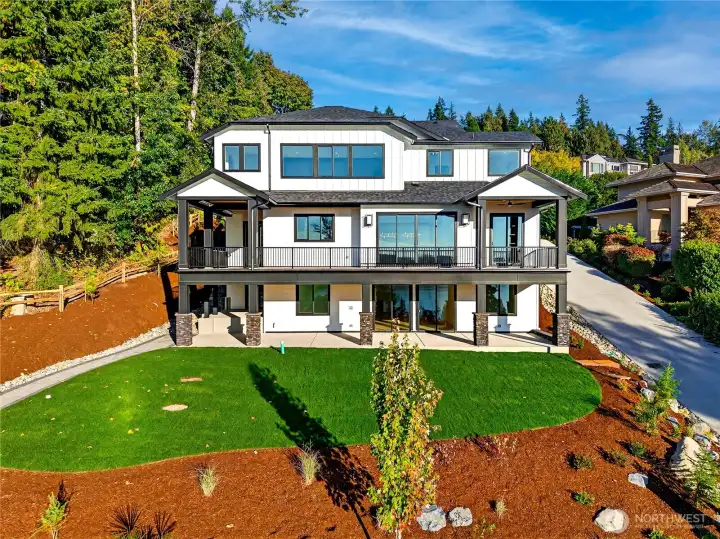 Home is designed to maximize stunning Lake Sammamish views from every level.