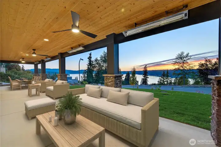 Enjoy lower level covered patio with both fans and heating elements for year round enjoyment.