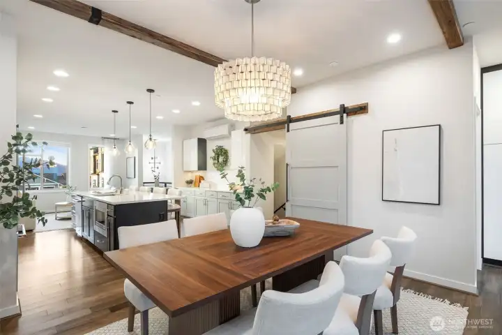 Barn door adds privacy between living level and lower guest quarters.