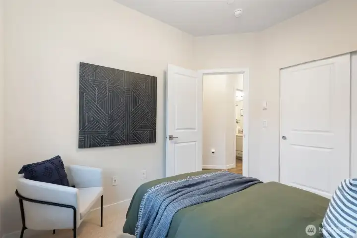 The two secondary bedrooms share a full hall bathroom.