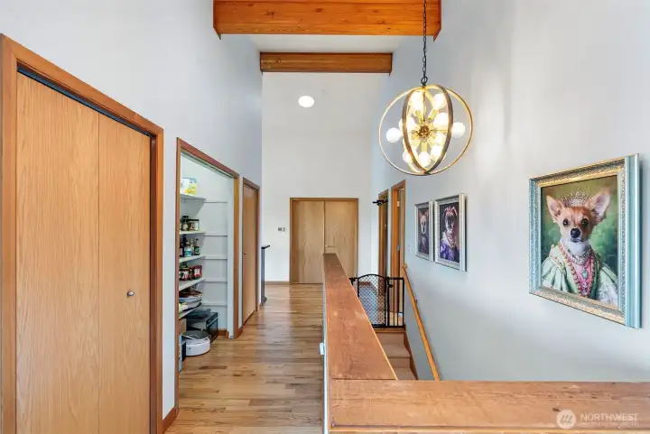 View from Entry - Storage and staircare to Lower Level (primary bedroom straight ahead & 2nd bedroom to the immediate right)