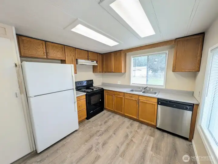 Kitchen overlooks the huge back yard.