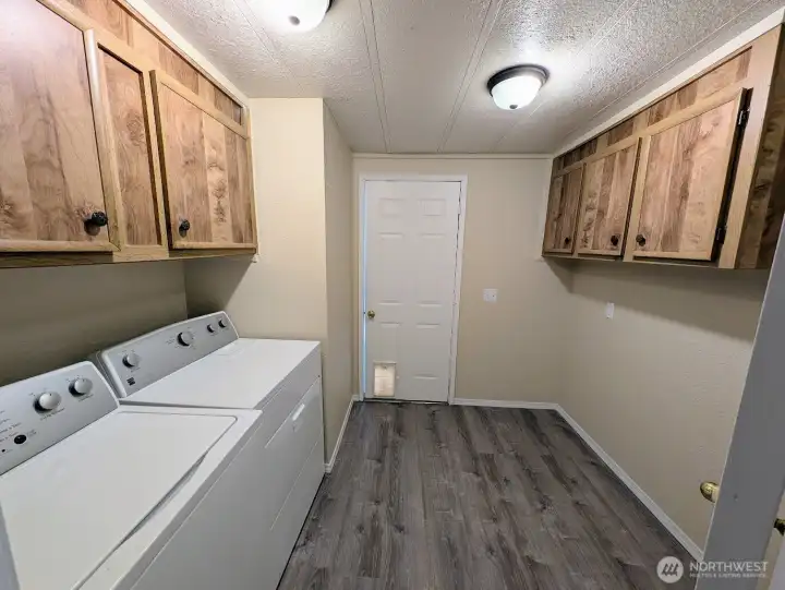 Good sized utility room with access to the back yard.