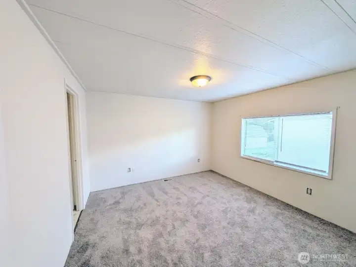 Primary bedroom with full bath off.