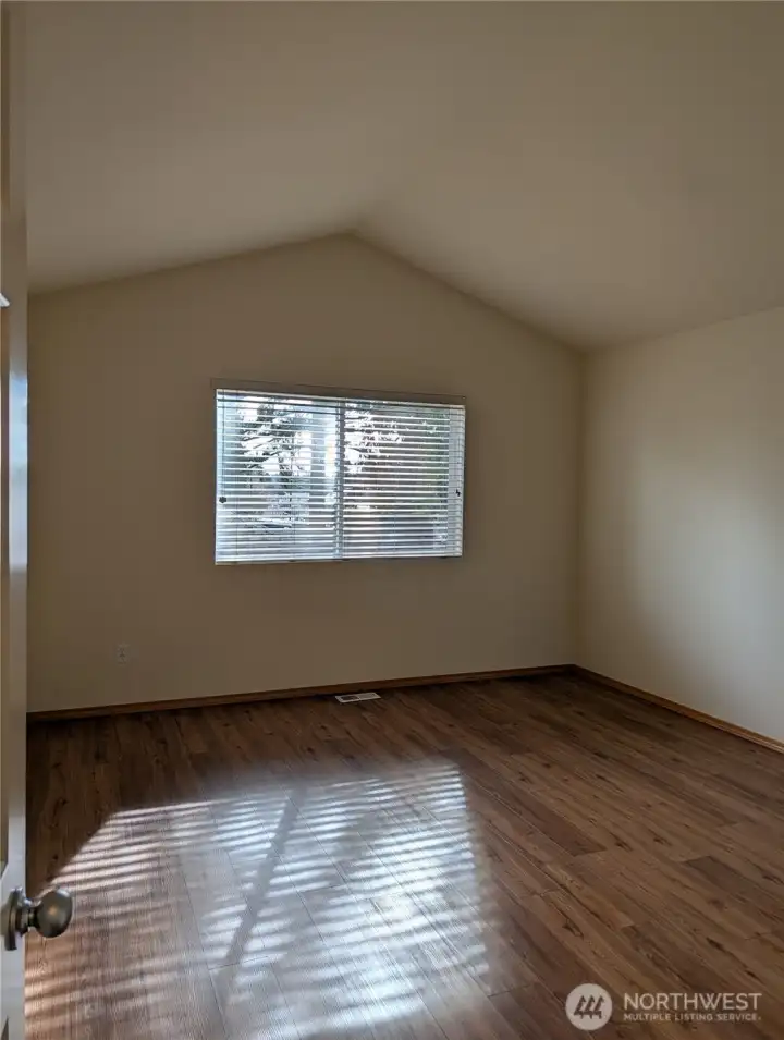 Primary Bedroom with Vaulted ceilings