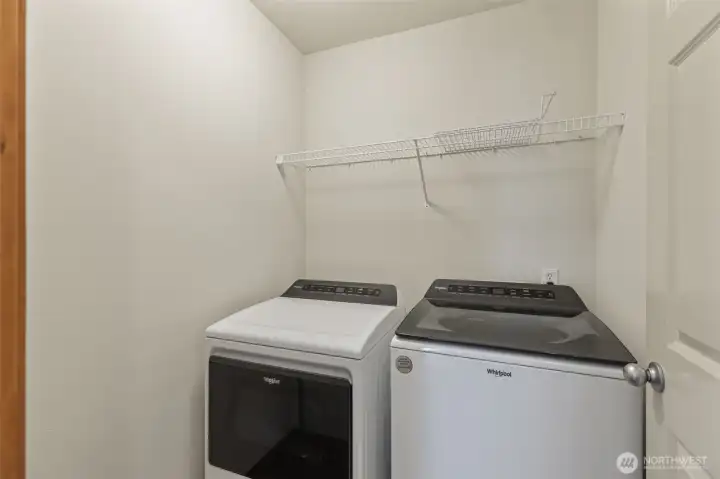 Laundry on 2nd floor hallway between the bedrooms and 2nd full bath