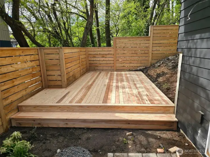 Photo features a beautiful deck of a similar home.