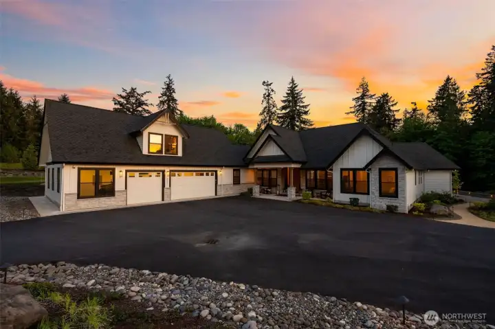 Main house and garage with above suite