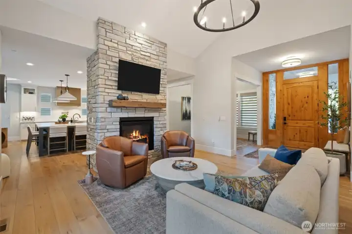 Entry and formal living room with fireplace