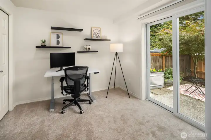 Entry level bedroom, currently being used as an office.
