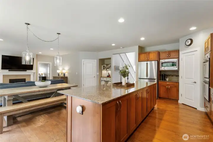 Kitchen flows to dining room.